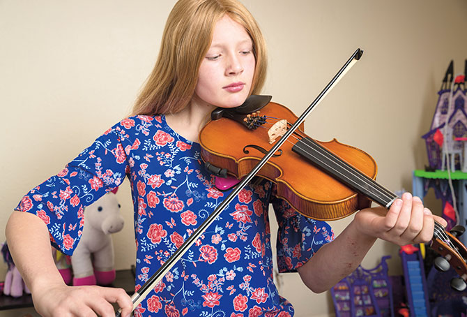 enlargeable photo of a girl playing the viola