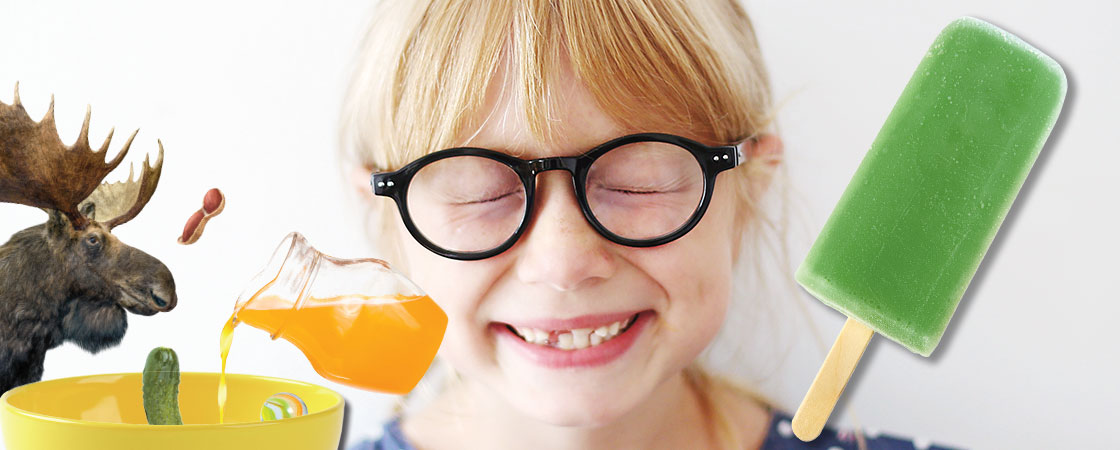 a girl smiling next to a green ice pop and a bowl of ice pop ingredients 