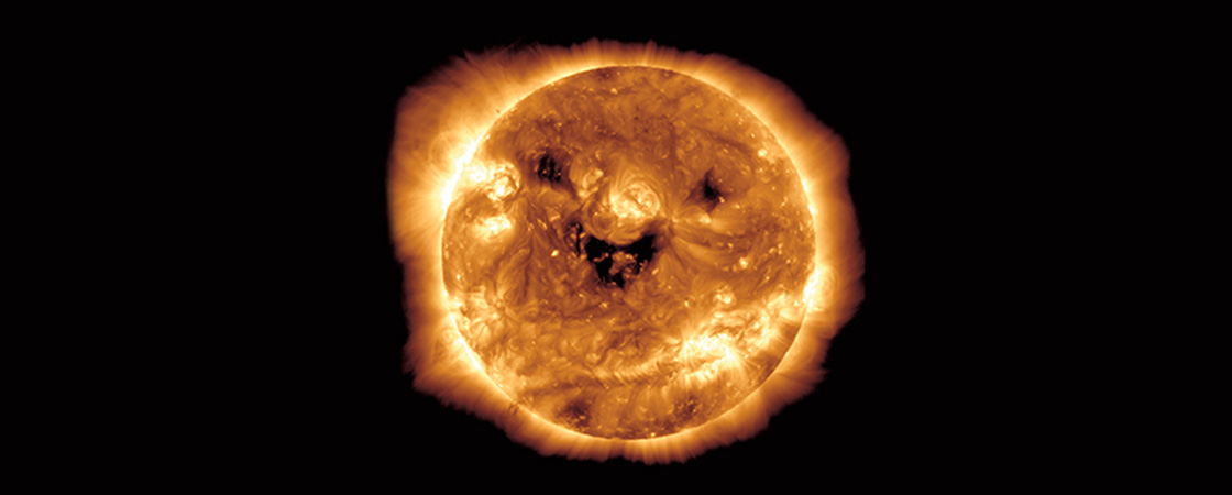 Image of the sun appearing to be smiling